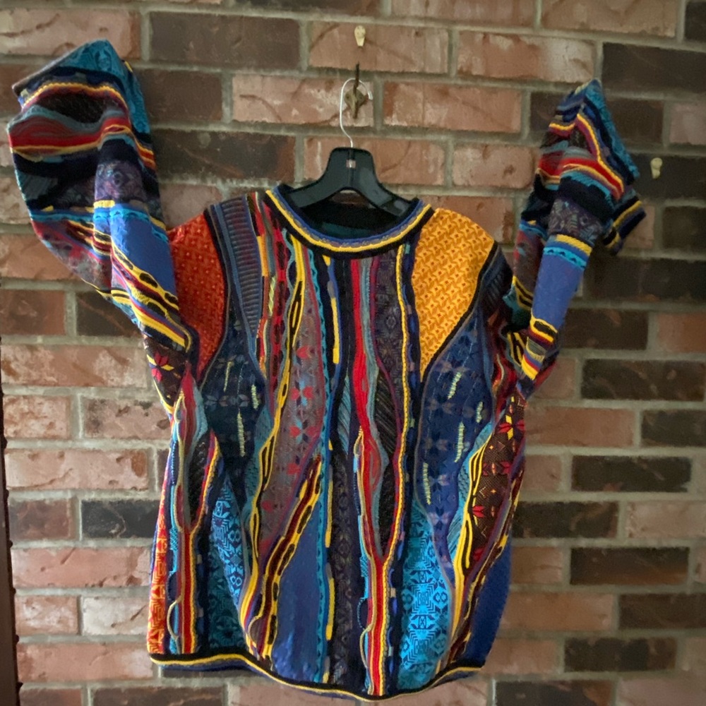 Tundra man’s sweater. New wot. Never worn. Multi bright colors. No fading.